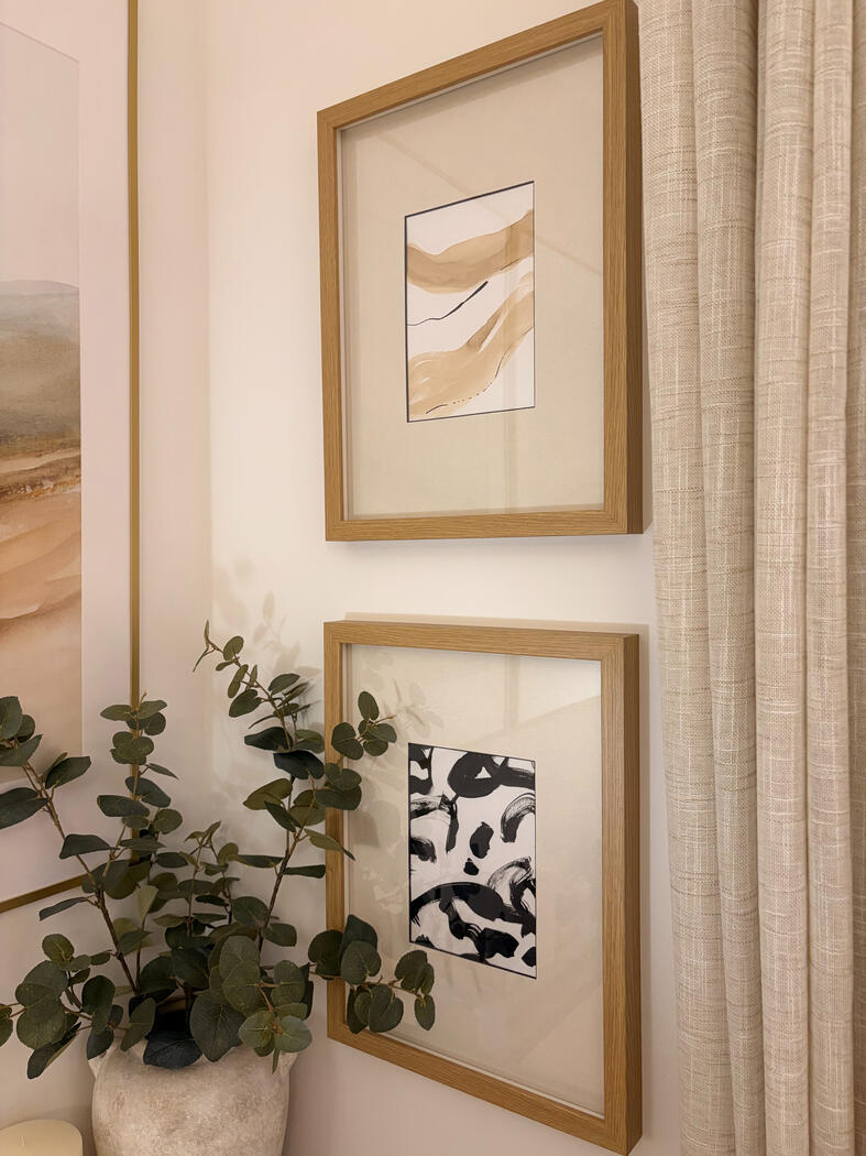Framed abstract artwork in modern stylish interior.